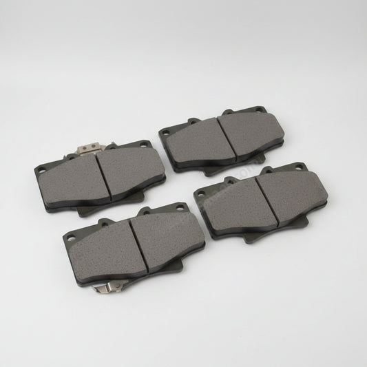 Front Disc Brake Pad Kit for Land Cruiser 70 & 80 Series, Hilux, 4Runner, T100 (1984–2004) — Part #04491-60090 — fits Genuine Toyota, TRW, Textar, Blue Print